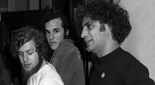 Abbie Hoffman talks with students in a hallway in 1972